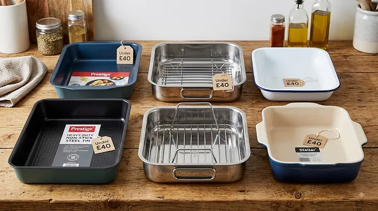 Selection of the best roasting tins under £40 arranged on a kitchen worktop
